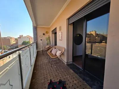 a balcony with a view of a city at Bagatelle House 2 in Marrakech