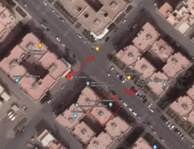an overhead view of a city intersection with buildings at proche aéroport, idéal pour travailler in Marrakech