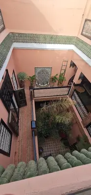 an overhead view of a room with plants andotics at Riad Musa in Marrakech