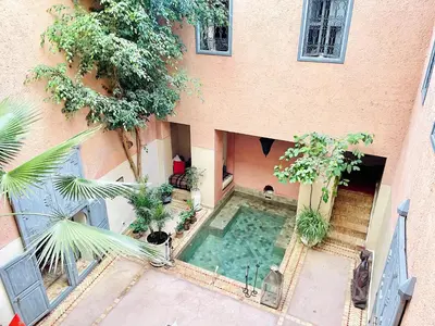 an overhead view of a house with a swimming pool at Exclusive and stylish 4-bedroom Riad with plunge pool in Marrakech