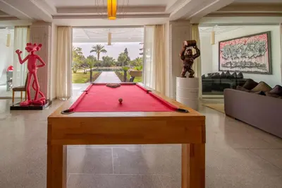 a living room with a pool table in it at Villa Fima Kech in Marrakech