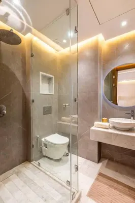 a bathroom with a shower and a toilet and a sink at New ! Splendid and cosy apartment in Marrakech