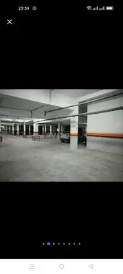 a picture of a parking garage with cars in it at appaartement M23 premium village in Marrakech