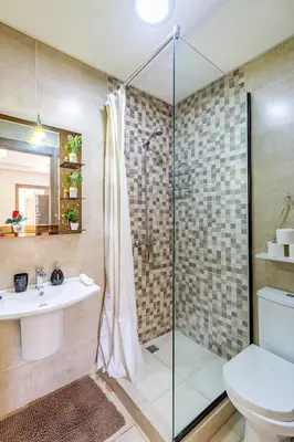 a bathroom with a shower and a sink and a toilet at favorite in the city center - 100% Equipped in Marrakech