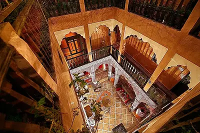 an overhead view of a building with a patio at Riad Mille Et Une Nuits in Marrakech