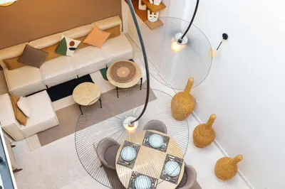 an overhead view of a living room with a table at Riad 2 chambres & Petit Déjeuner - Wifi - Top Location Médina in Marrakech