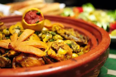 a bowl of food with pasta and vegetables in it at Riad Al Mamoune in Marrakech
