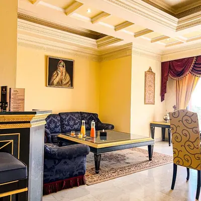 a living room with a couch and a table at Royal Mirage Deluxe in Marrakech