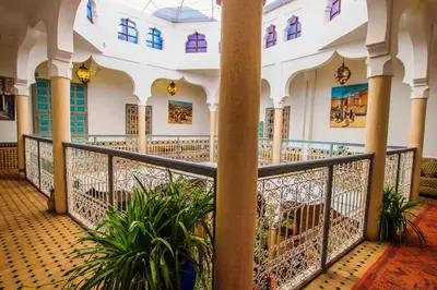 a view of the lobby of a building with plants at Riad Zinoun & Spa 11 Rooms in Marrakech