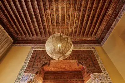 a ceiling of a building with a large orb at Ryad Dyor in Marrakech