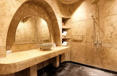 a bathroom with a sink and a shower at Marrakech Riads, Angsana Heritage Collection in Marrakech