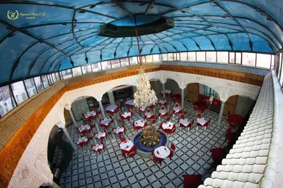 an overhead view of a room with a table and chairs at Hotel Imperial Plaza & Spa in Marrakech