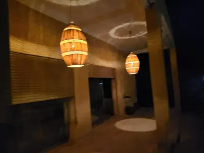 two lights hanging from the ceiling in a room at Dar Sofia Villa in Marrakech