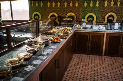 a kitchen with a buffet of food on a counter at Moroccan House in Marrakech