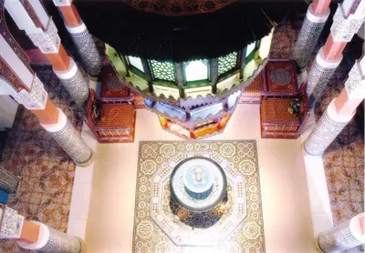 an overhead view of a building with a fountain at Moroccan House in Marrakech