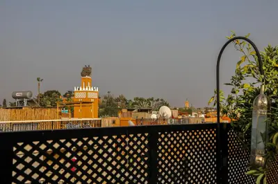 a view of a building with a clock tower at Riad Anya & SPA in Marrakech