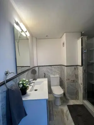 a bathroom with a toilet and a sink and a shower at Vitality Harmony A27 in Marrakech