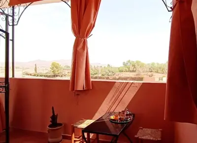 a window with a table in a room with a view at Studio l'Oasis de la Palmeraie in Marrakech