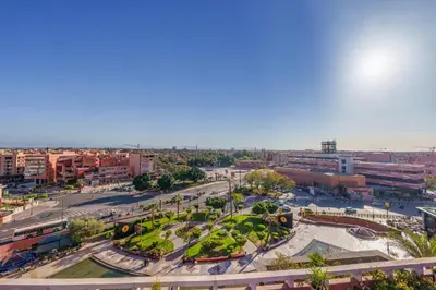 an aerial view of a city with a park at Appartement Chic Gueliz Plaza avec Vue in Marrakech