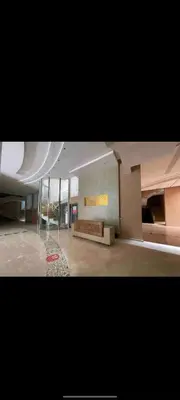 a large room with a couch in a building at Cosy apartment in Marrakesh, Guliz in Marrakech