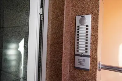 a door with a remote control attached to a wall at Charming Cozy 2 Bedrooms central Gueliz in Marrakech