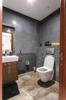 a bathroom with a toilet and a sink at Elite Escape - Marrakech Centre in Marrakech